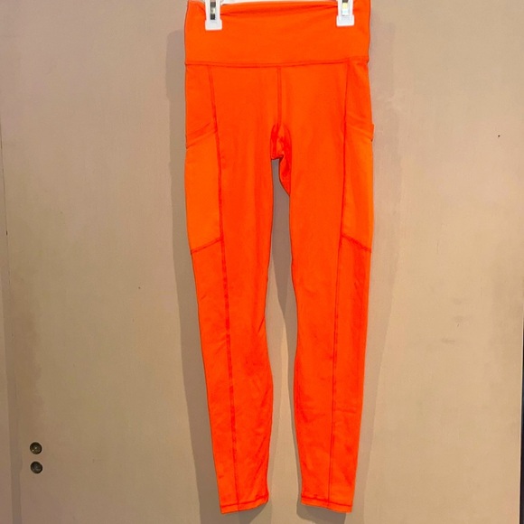Fabletics Powerhold bright neon orange leggings size XS with mesh side pockets - Picture 1 of 10
